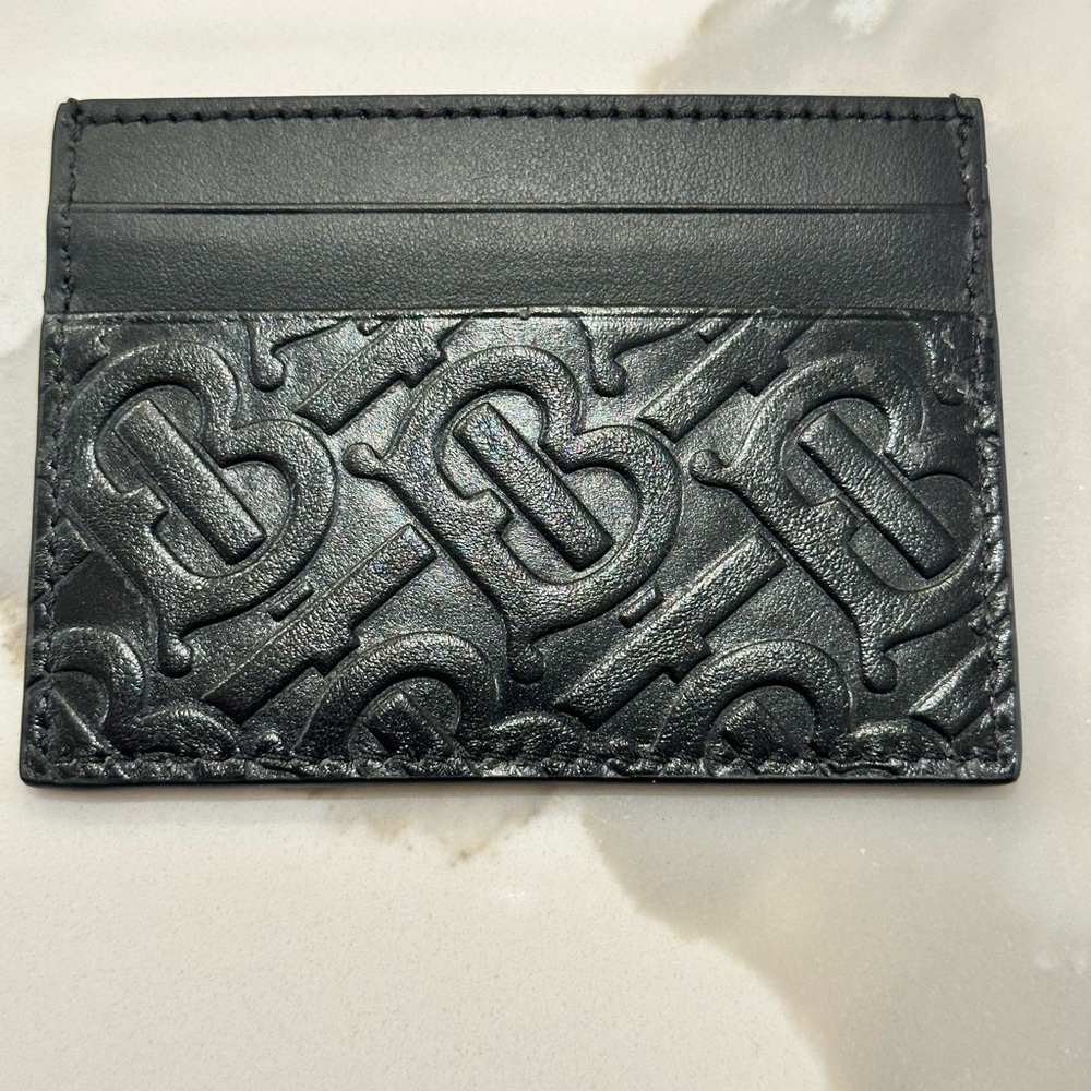 Authentic Burberry embossed card holder black.  With free gift.